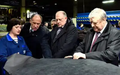 Local politicians tour Russian tannery