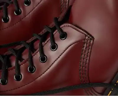 Dr Martens posts half-year loss