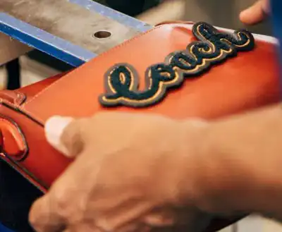 Tapestry hits leather-sourcing goals