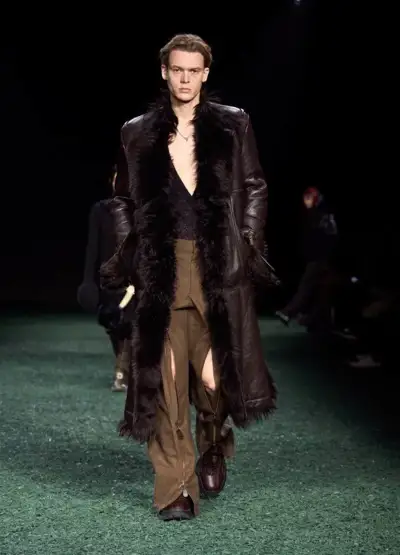 Leather trenches and long boots line up at Burberry