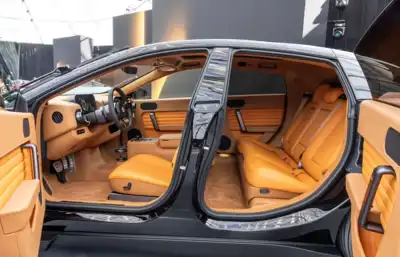Ferrari unveils first fully electric model, featuring leather interior