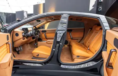 Ferrari unveils first fully electric model, featuring leather interior