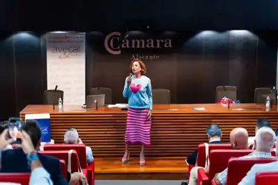 Designer makes surprise appearance at footwear meeting